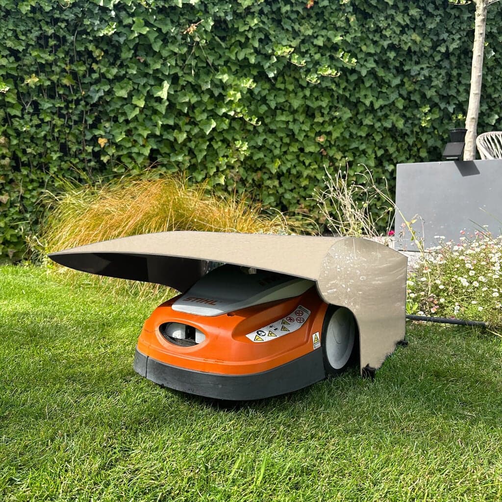 Robotgrasmaaier-garage Ivoor